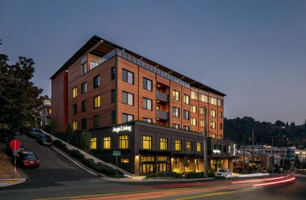 The main entrance of Aegis Living Lake Union at dusk