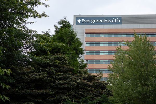 The EvergreenHealth building with trees in the foreground