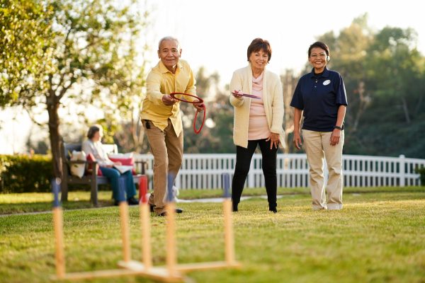 Residents playing a yard game