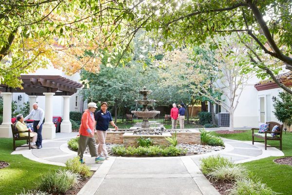 Residents walking in a courtyard