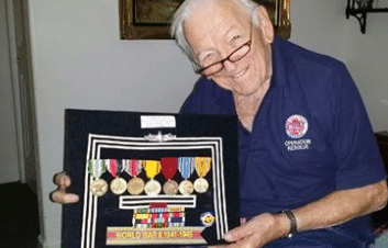 Art Peterson holds display of military medals