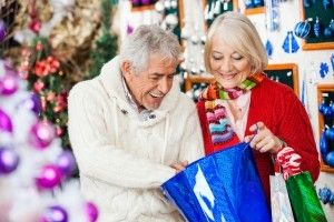 A senior couple holiday shopping