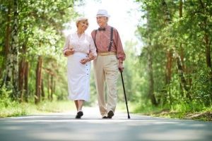 a senior couple walking